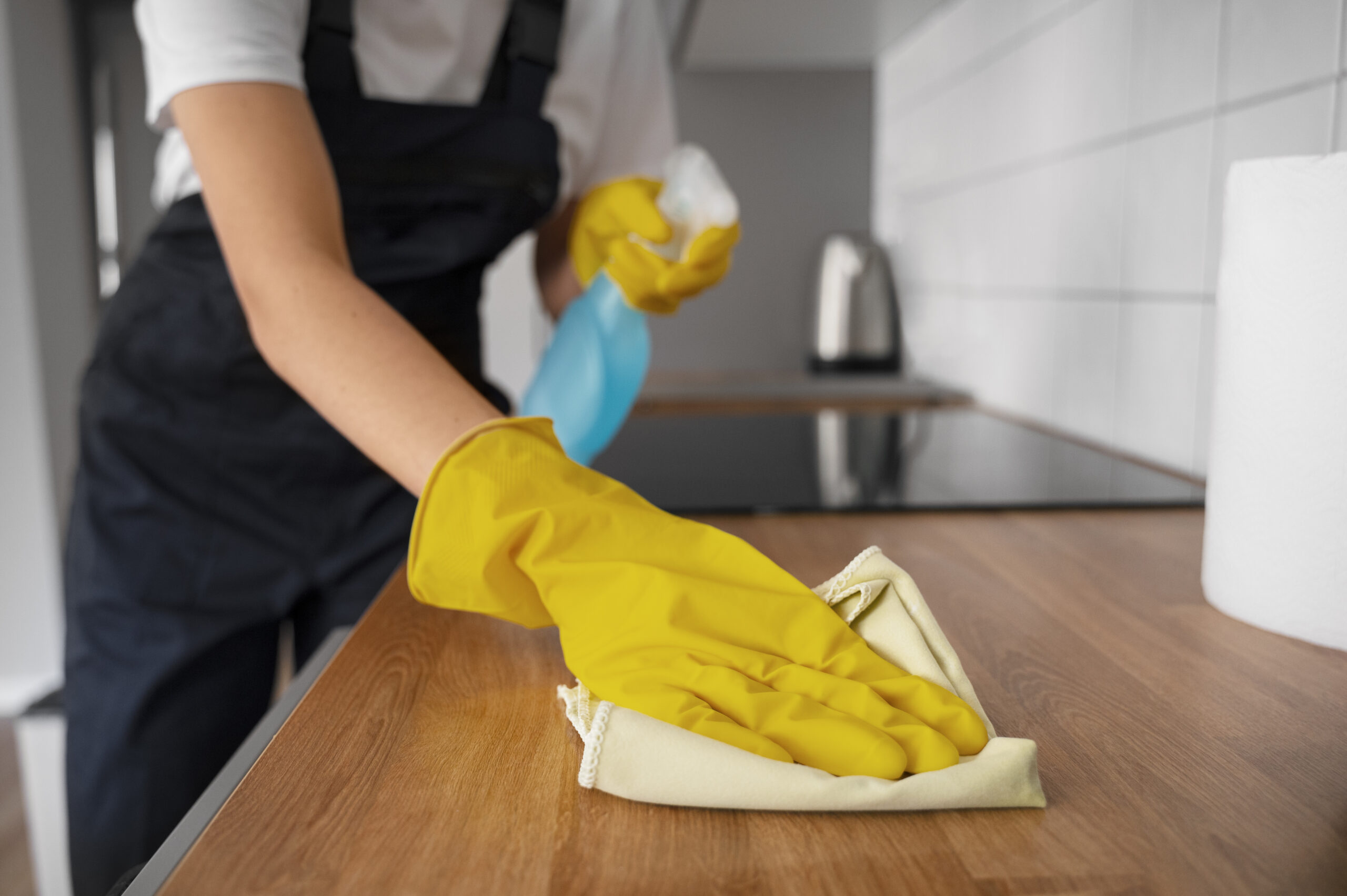 front view woman cleaning home